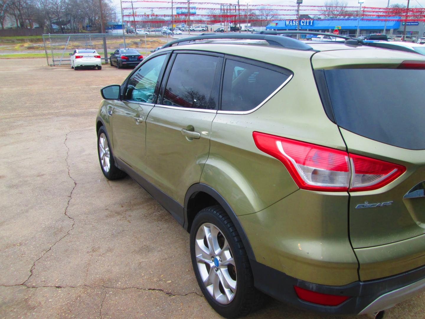 2013 GREEN Ford Escape SEL FWD (1FMCU0HX0DU) with an 1.6L L4 DOHC 16V engine, 6-Speed Automatic transmission, located at 1815 NE 28th St., Fort Worth, TX, 76106, (817) 625-6251, 32.795582, -97.333069 - Photo#7